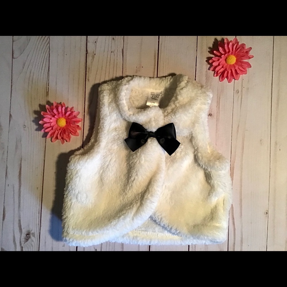 Just One You made by Carter’s white faux fur vest